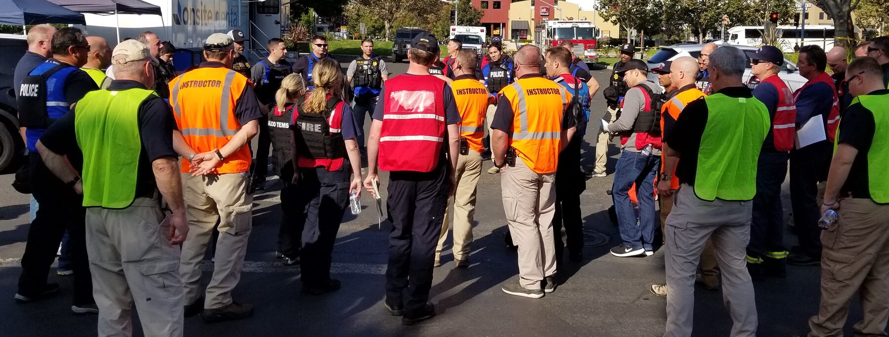 Public safety personnel and instructors gathered during a multi-agency exercise